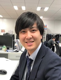 AIソリューション営業部石塚の顔写真